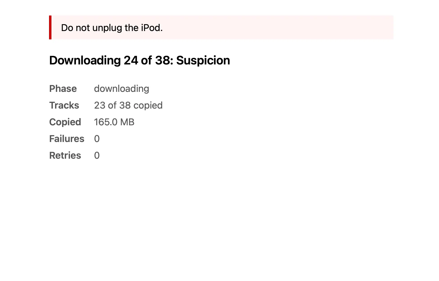 Sync in progress under a red warning: Do not unplug the iPod. Downloading track 24 of 38, Suspicion, with 23 tracks copied, 165 MB, 0 failures and 0 retries